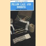 Pillow lace and bobbins door Jeffery Hopewell