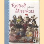 Knitted Meerkats door Sue Stratford